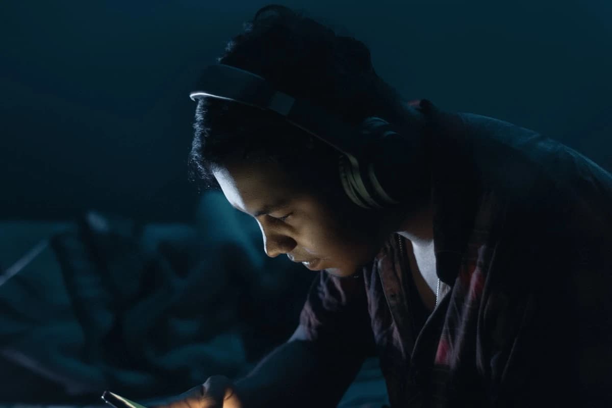 Listener hearing a personalized AI music cover on headphones
