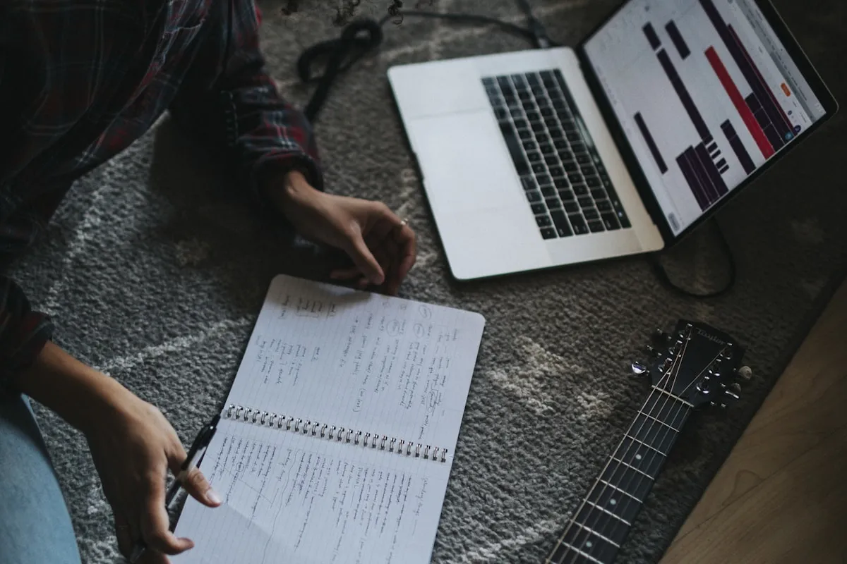 Songwriter comparing sung takes of one verse