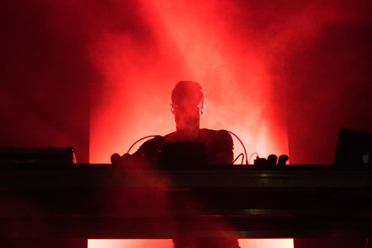 DJ layering an isolated vocal over a separate instrumental