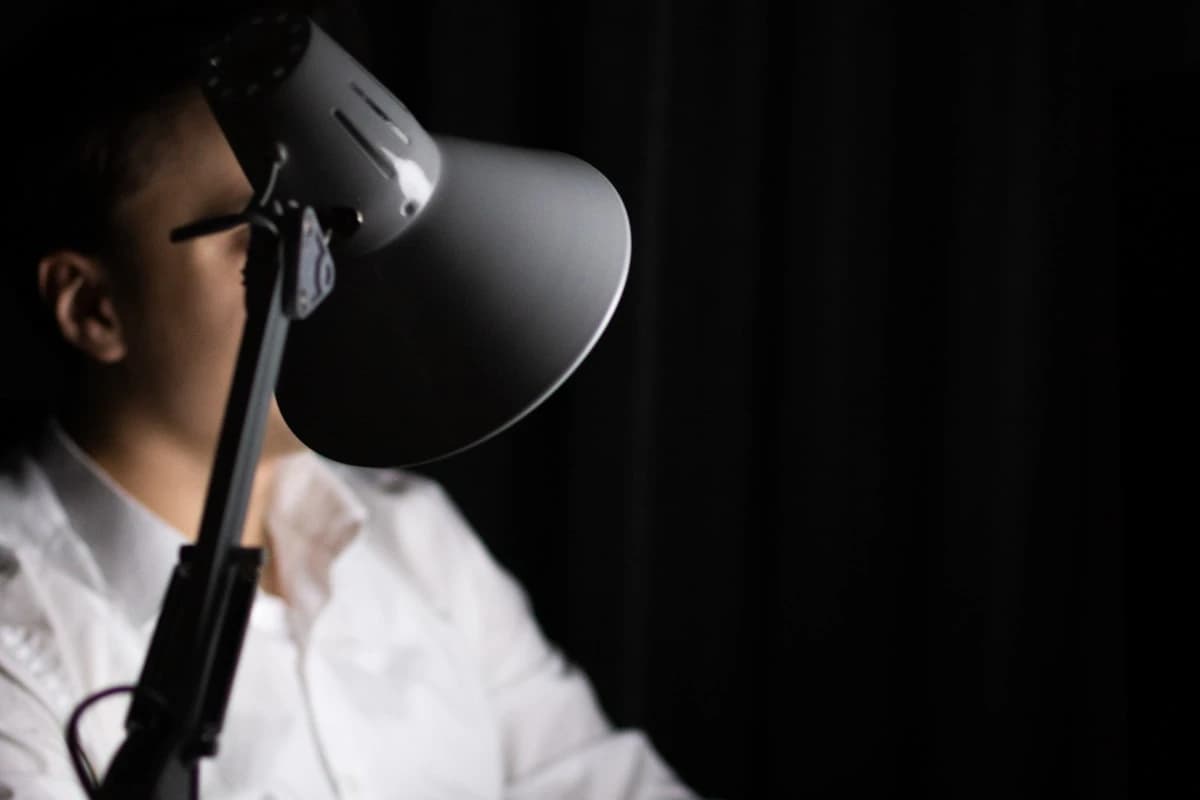 Creator editing an audio segment at a desk